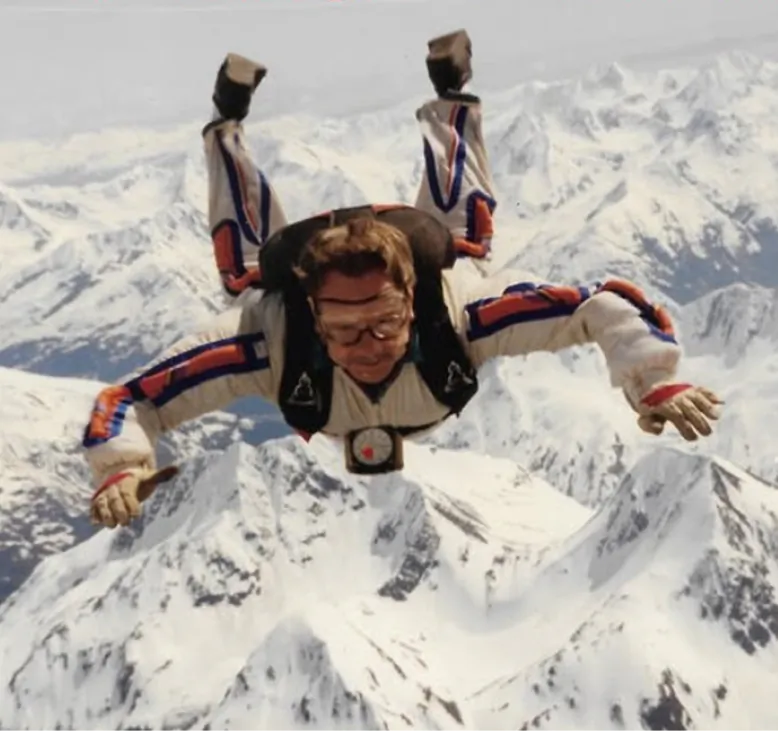 Gregg Brelsford skydiving over Alaska glaciers in Girdwood